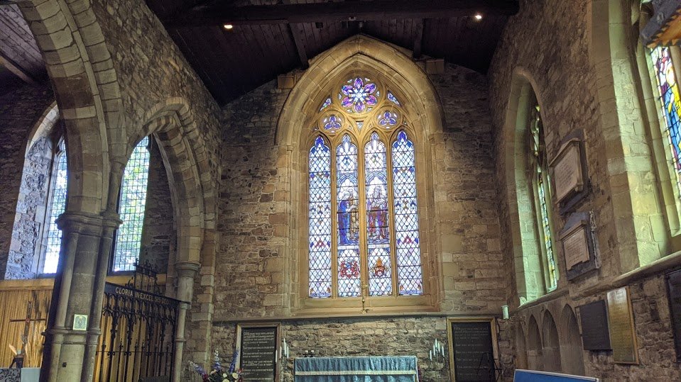 The Victorians added aisles to the church, and knocked out much of the south wall of the nave, adding in this big brick arch to shore up the crumbling church and stop it falling down. They also took apart, rebuilt, and stabilised the top tiers of the tower.