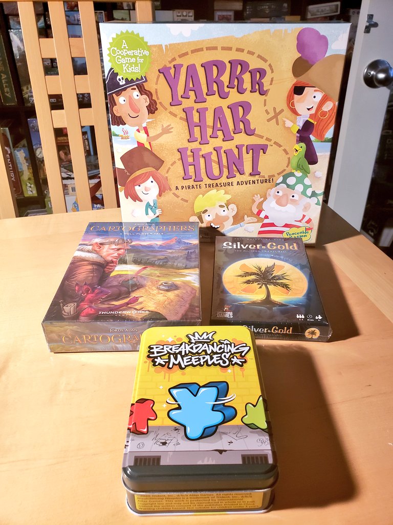 CohortVIIIGames's tweet photo. Our daughter is into pirates so we stopped by our FLGS @RainyDayGames yesterday to find a game. She's also big into breakdancing after the scene in Angry Birds 2 so we ended up with @benlikesthings #BreakdancingMeeples plus #Cartographers for me, #YarrrHarHunt & #SilverAndGold. https://t.co/ARyp7It0Py