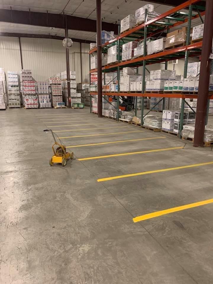 FakeOlesen's tweet photo. Painted some weight number guide lines at work today. Gerry in receiving has really been struggling with his weight during this pandemic. #heretohelp #curling https://t.co/QSldPIT316