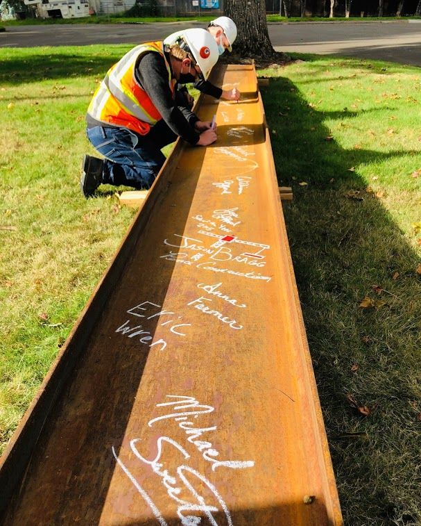 PenceConst's tweet photo. Community members, staff, students, and our Pence project team celebrated the new beginning of Gardiner Middle School this week in Oregon City. The structural beam, now covered in signatures will be erected in the new building! https://t.co/SzuEualuwM