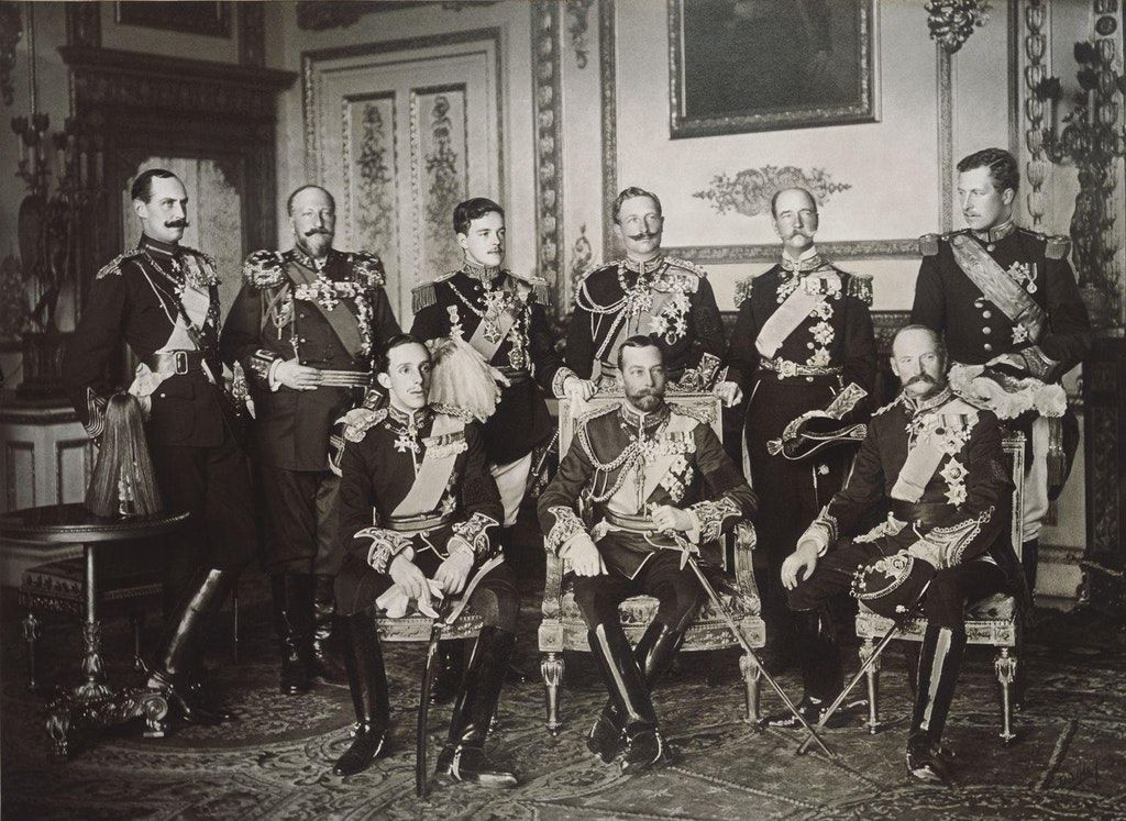 Standing, from left to right: King Haakon VII of Norway, Tsar Ferdinand of Bulgaria, King Manuel II of Portugal, Kaiser Wilhelm II of the German Empire, King George I of Greece and King Albert I of Belgium.
