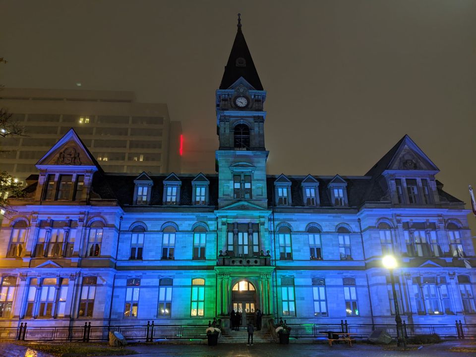 City Hall is lit up green and blue to celebrate #WasteReductionWeek!  Looking to reduce single-use items? Visit our page for waste reduction tips: halifax.ca/wasteless