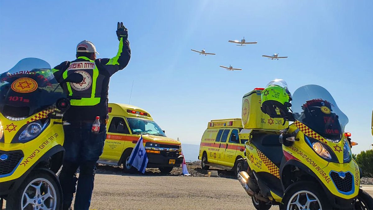 CanadianMDA's tweet photo. When MDA first responders sign up for the job, they know they're signing up for blood, sweat and tears. As tough as the job may get, a six plane flyover on a bright sunny Friday brings a smile to everyone's face. Shabbat Shalom! https://t.co/gLVYRgmk3n