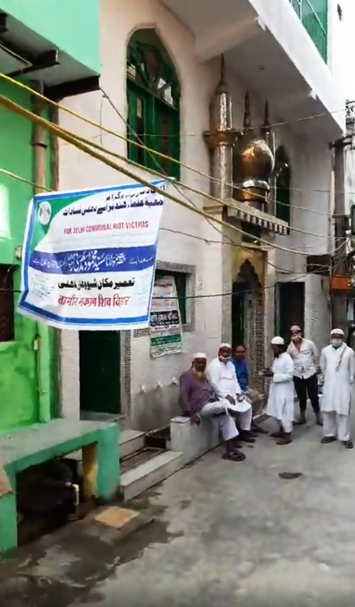 JamiatUlama_in's tweet photo. JUH President Maualna M Usman Mansoorpuri handing over the key of newly constructed houses to Delhi riot victims &amp; inaugurated riot torn Tayyibah Masjid in Karawal Nagar, NE Delhi. It must be noted Jamiat has reconstructed 156 houses, 139 shops &amp; 10 mosques. https://t.co/MXIOlpRkRU