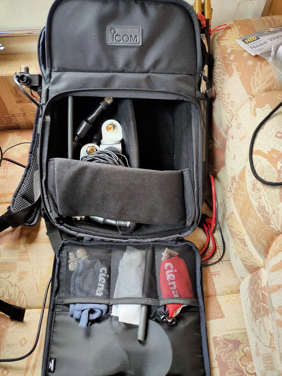 M0IAX's tweet photo. Some pictures of my @icom_uk #LC192 backpack and what I'm carrying to build my #ic705 field station. Includes #superantenna #mp1c, #buddipole shock cord whip, #mAT705 auto tuner some feeder adapters towel to keep radio shiny and dry a face mask SO239 mount #amateurradio #hamradio https://t.co/FsRywAzeVK