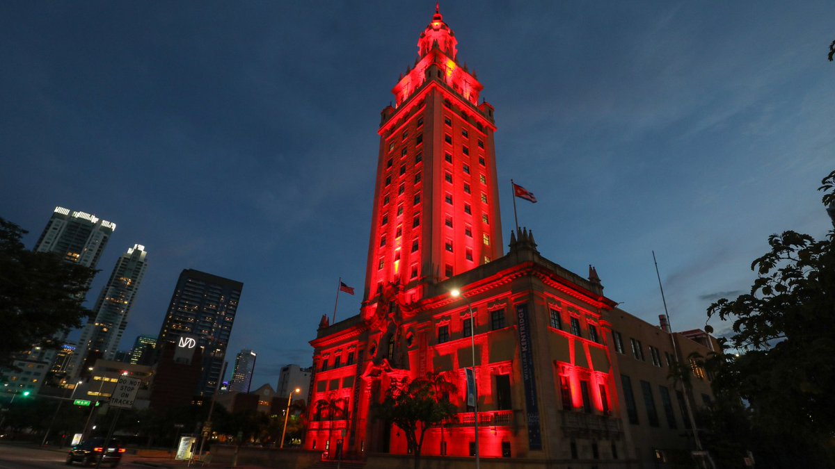InformedFamily's tweet photo. Taking a drive in Miami this evening? Be sure to cruise by the American Airlines Arena, Miami Tower, and the Historic Landmark Freedom Tower at @MDCollege. 

All three locations will be lit up in red at sunset tonight (around 6:45 p.m.) to kick off #RedRibbonWeek! https://t.co/2VYH0tQCuj