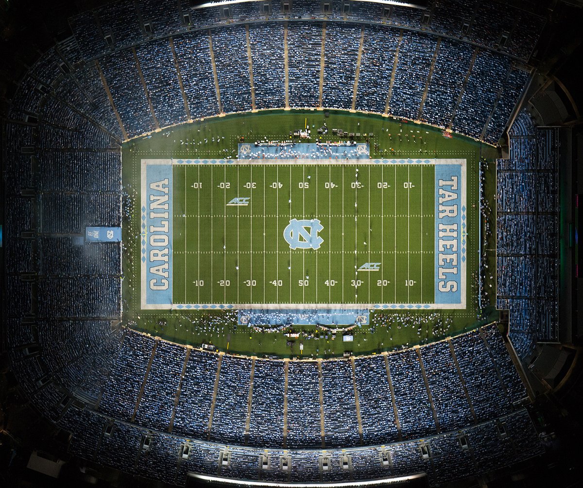 TeamBrockUSA's tweet photo. The No. 14 @GoHeels football team will host in-state rival @NCState tomorrow! The game will be played at UNC’s @Kenan_Stadium which features @AstroTurfUSA on top of Brock PowerBase/PRO. Good luck, Tar Heels! #ShockPads #SaferSports #BrockUSA https://t.co/jB4UBnfkuA
