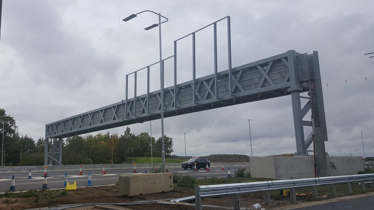 New gantries have ladder access, a walkway, mesh enclosures to stop tools getting dropped on cars below, laybys to park maintenance vehicles. The tech comes with more access panels to replace parts, reducing the need for future road closures (in theory) 8/