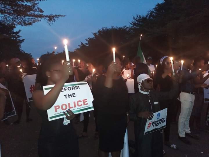 CollinsUma's tweet photo. Benue mourns with Lekki, Port Harcourt, Kano, Aba, Enugu, Benin, Ogbomosho, Abuja, Surulere, Jos, Kaduna, Zaria, Uyo...
We lit candles this evening for every fallen hero. 
#LekkiMassacre
#EndSARS
#BenueProtest https://t.co/cj2oTiZOPv