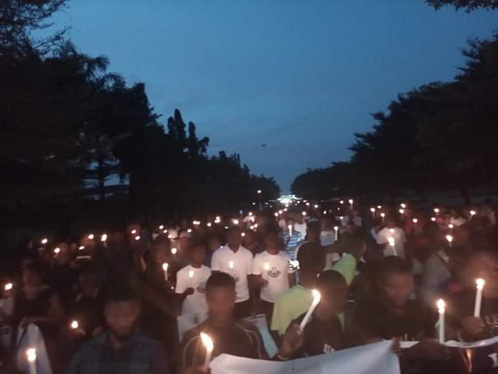 CollinsUma's tweet photo. Benue mourns with Lekki, Port Harcourt, Kano, Aba, Enugu, Benin, Ogbomosho, Abuja, Surulere, Jos, Kaduna, Zaria, Uyo...
We lit candles this evening for every fallen hero. 
#LekkiMassacre
#EndSARS
#BenueProtest https://t.co/cj2oTiZOPv