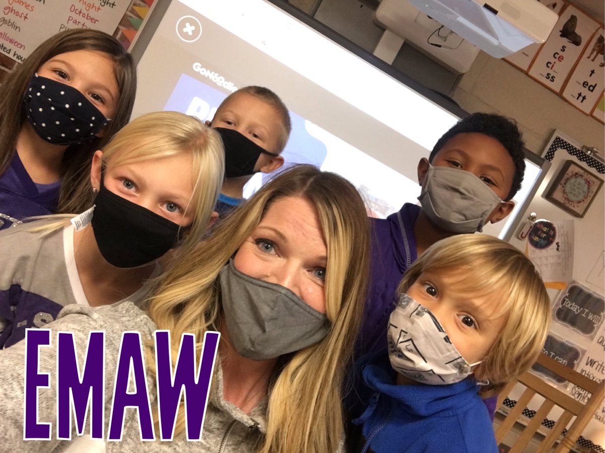 jennromine1's tweet photo. These first graders are ready for the Sunflower 🌻 Showdown! #aclassdivided #EMAW #RCJH #KU #KSTATE 💜💙❤️ https://t.co/8yKQry80S0