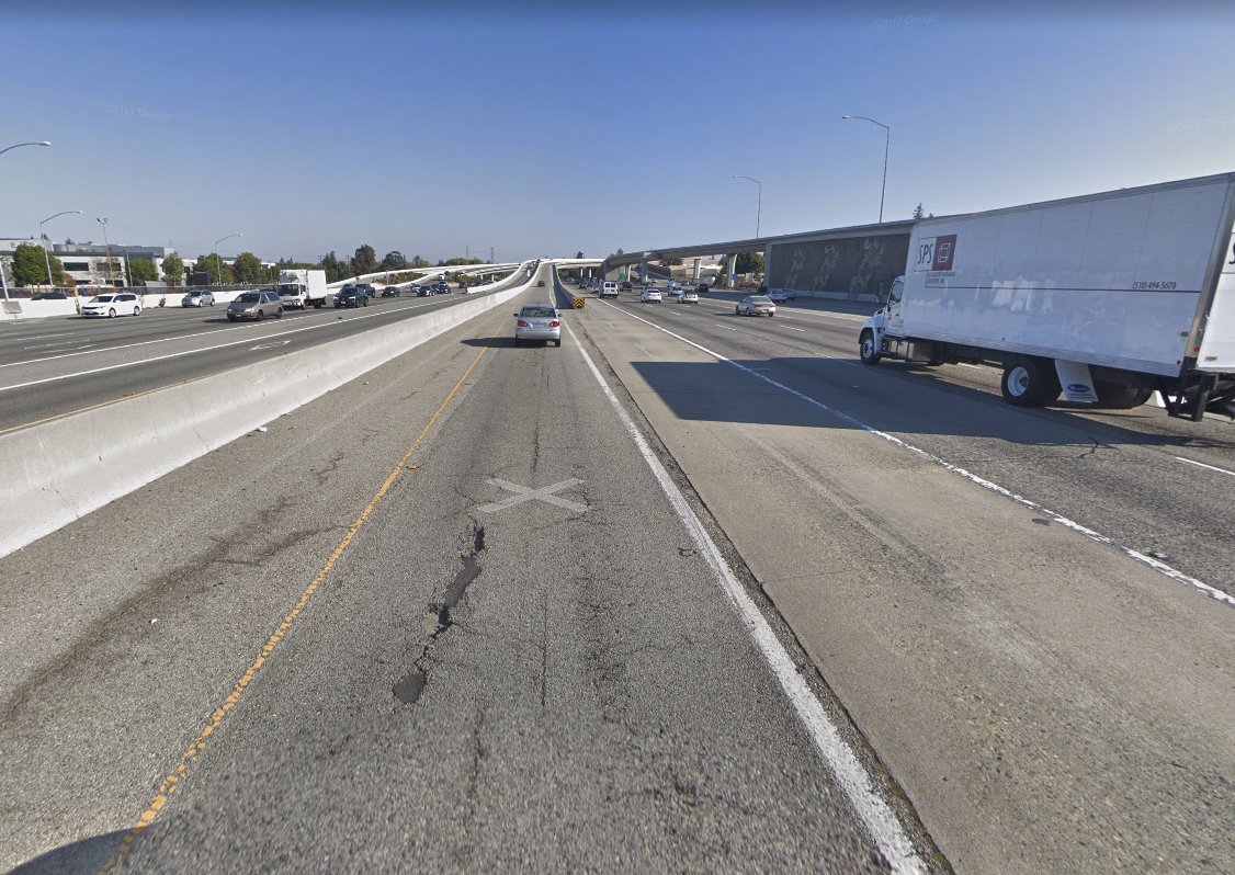 in CA, left exits are not that common; many drivers have trouble navigating them if they're not familiar with the area. lots of people end up crossing over the solid white line at the last minute. in fact, this area almost looks like another lane!