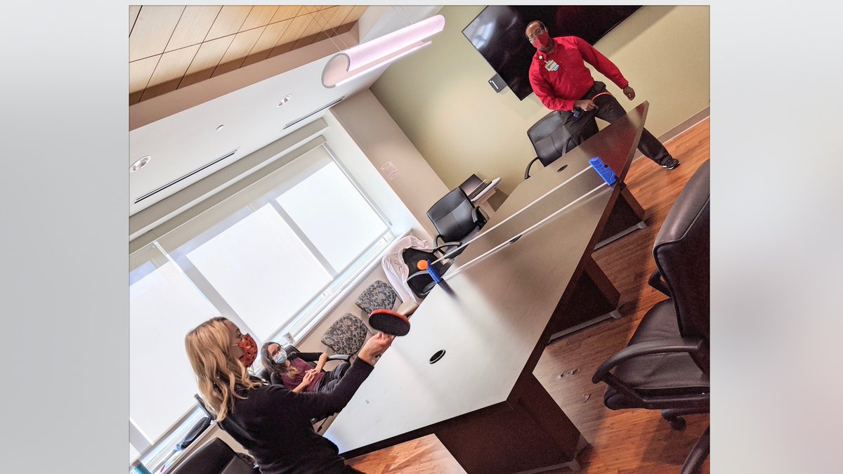 @VJeanneretl brought in a net, turning our workroom table into a makeshift ping pong table! @a5stripes and I battle it out after rounds... guess who won?? @EmoryNeurology @GradyHealth #wellness