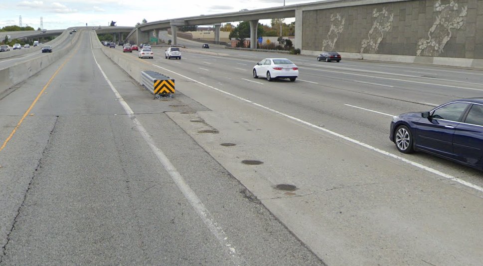 in addition, the road markings were ambigious and faded. i used to drive this route every day; this section of the freeway isn't in good shape. the road bed is torn up by heavy trucks; stripes are faded and haven't been painted in years.