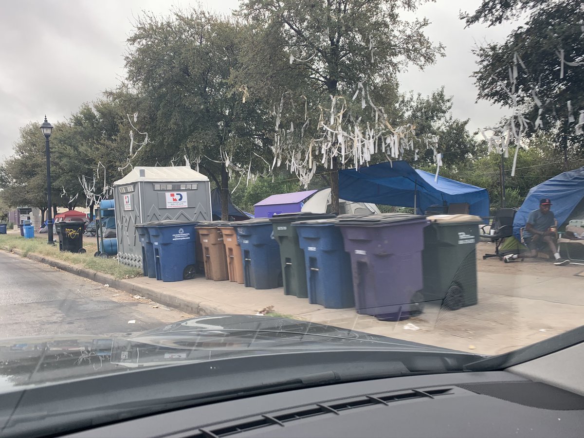 The overrun homeless camp on Cesar Chavez St in Austin now has toilets and trash cans. But, look what they did with the free toilet paper. 
 @MayorAdler #makeaustinsafeagain #Austin #Homeless