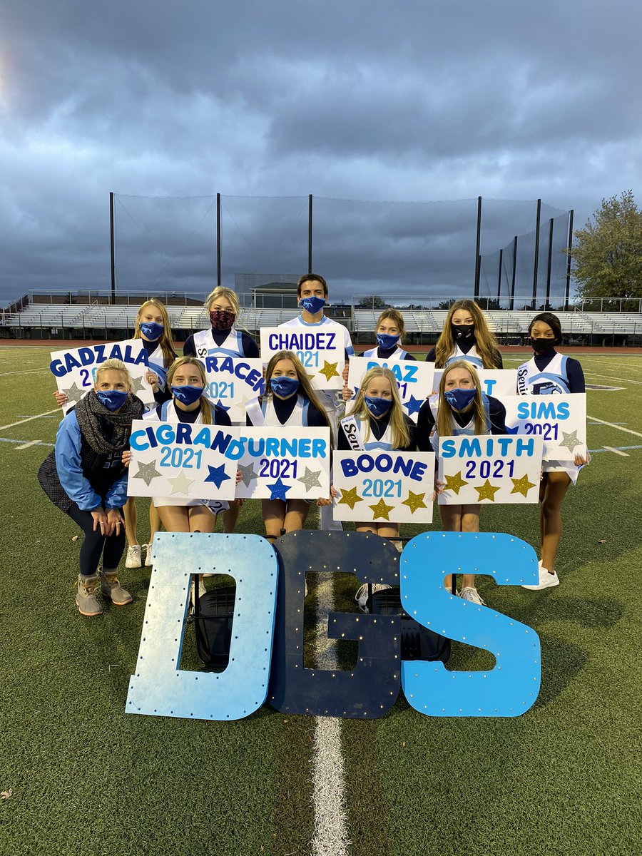 DGS_Cheer's tweet photo. Celebrating our Amazing Seniors!!! Wish it was at a Football Game, but still under the Friday Night Lights. @DGSSports @DownersSouth https://t.co/qowR94O1UE
