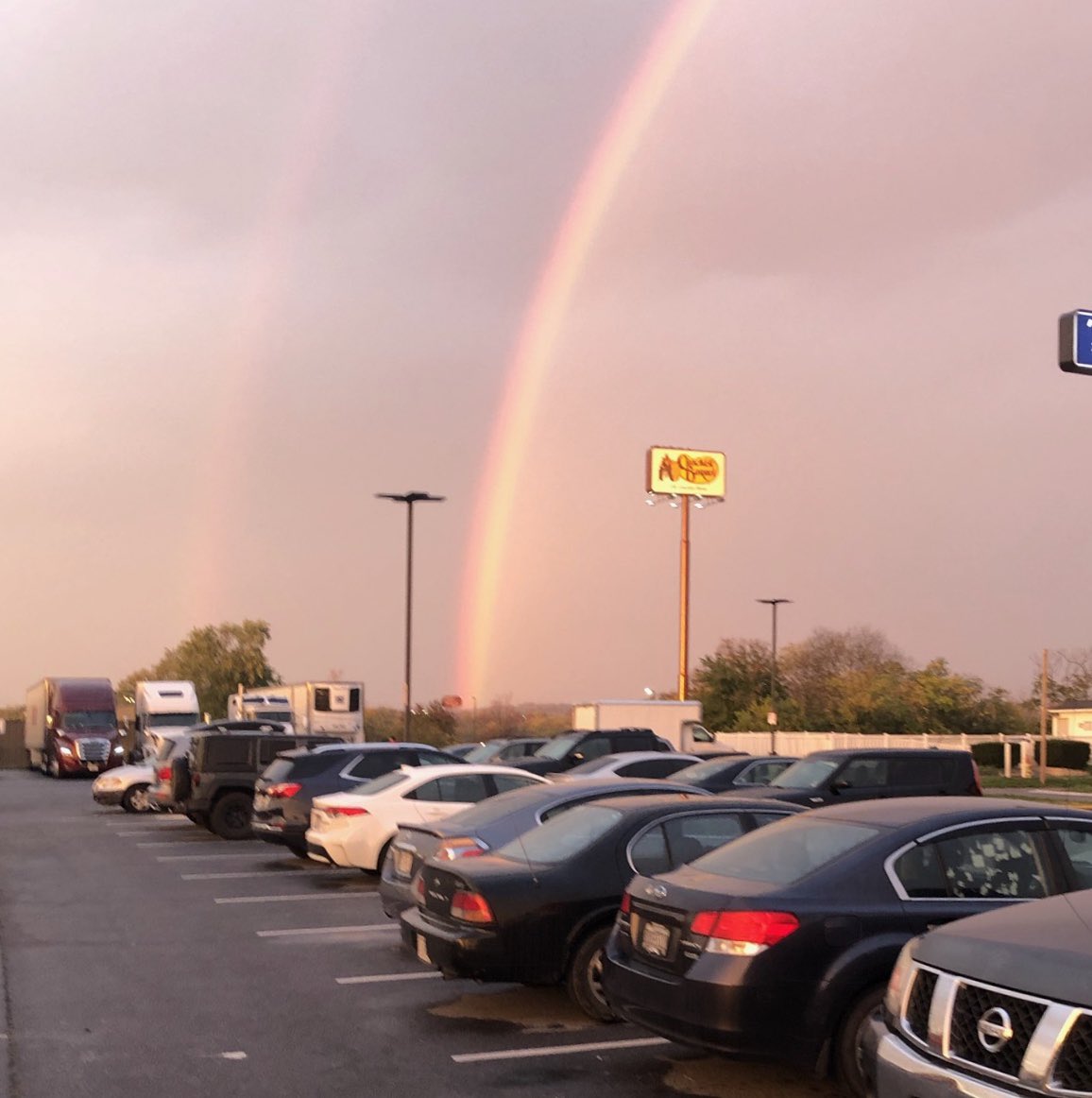 MattWalshBlog's tweet photo. Coming out of the hotel, I was saying we should go to Cracker Barrel for breakfast. My wife was refusing and engaging in all kinds of anti-Cracker Barrel fake news propaganda. Then we saw a rainbow over the restaurant. A sign from God. Angels pointing the way. Beautiful. https://t.co/WF55VMHHiA