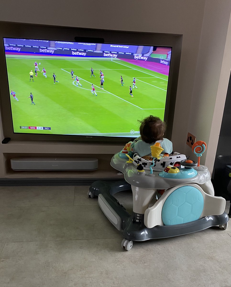 flump9's tweet photo. Hux has wheeled himself right in front of the TV! He’ll be disappointed when he eventually goes to the London Stadium and realises how far away from the pitch he is! https://t.co/VqJ5v1Gr6U