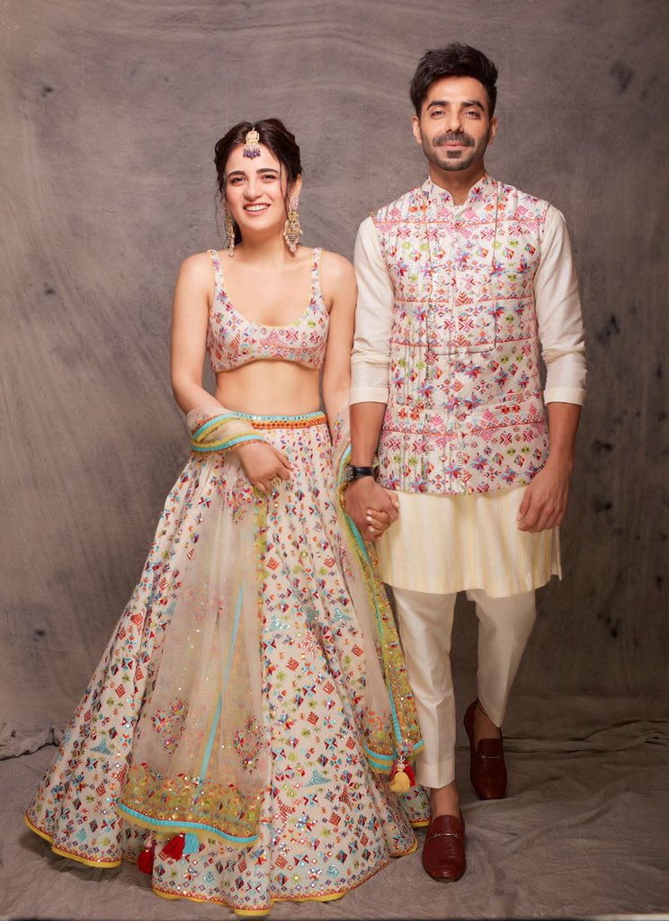 #RadhikaMadan and #AparshaktiKhurrana strike a pose during the ongoing #LakmeFashionWeek2020.