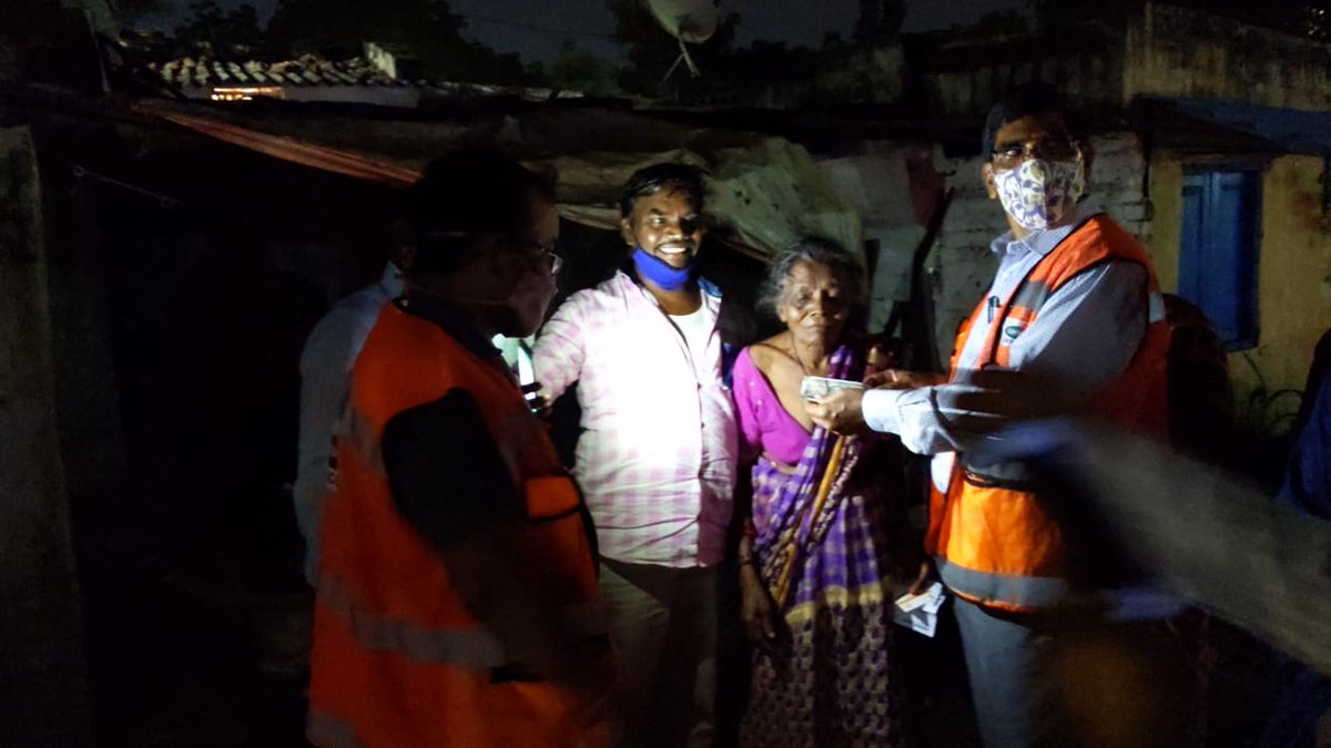 Distribution of financial assistance to people affected by heavy rains in Hamali Basthi Slum , Secunderabad by GHMc