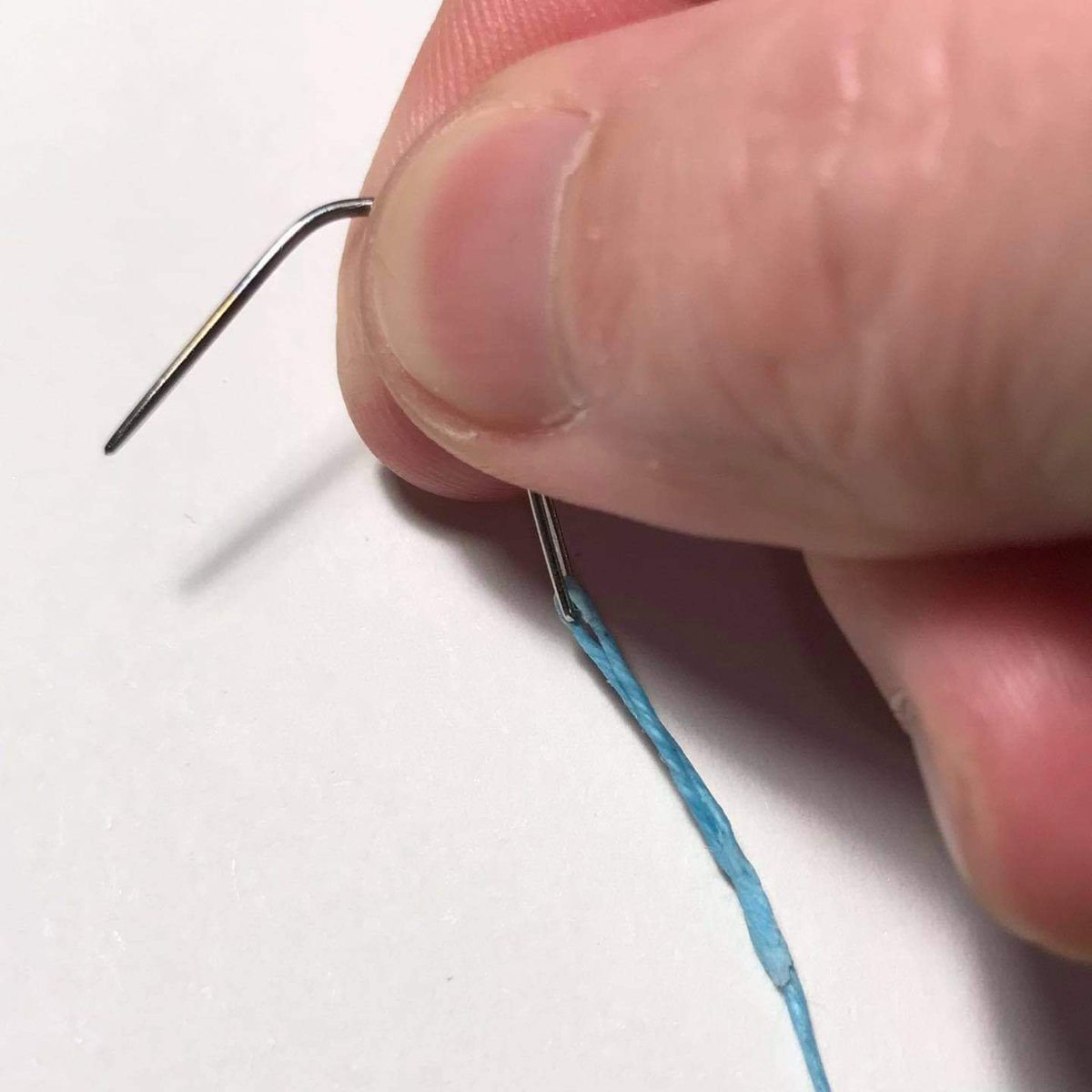 bailemorbooks's tweet photo. Huge hands? Tiny needle? 🤔
(Modded a short tapestry needle into a silly small needle for a silly small book.)
.
.
.
#wip #onthebench #bookbindingtools #sewingbooks #bookbinder #bookbindery https://t.co/gLf1kSuCFs