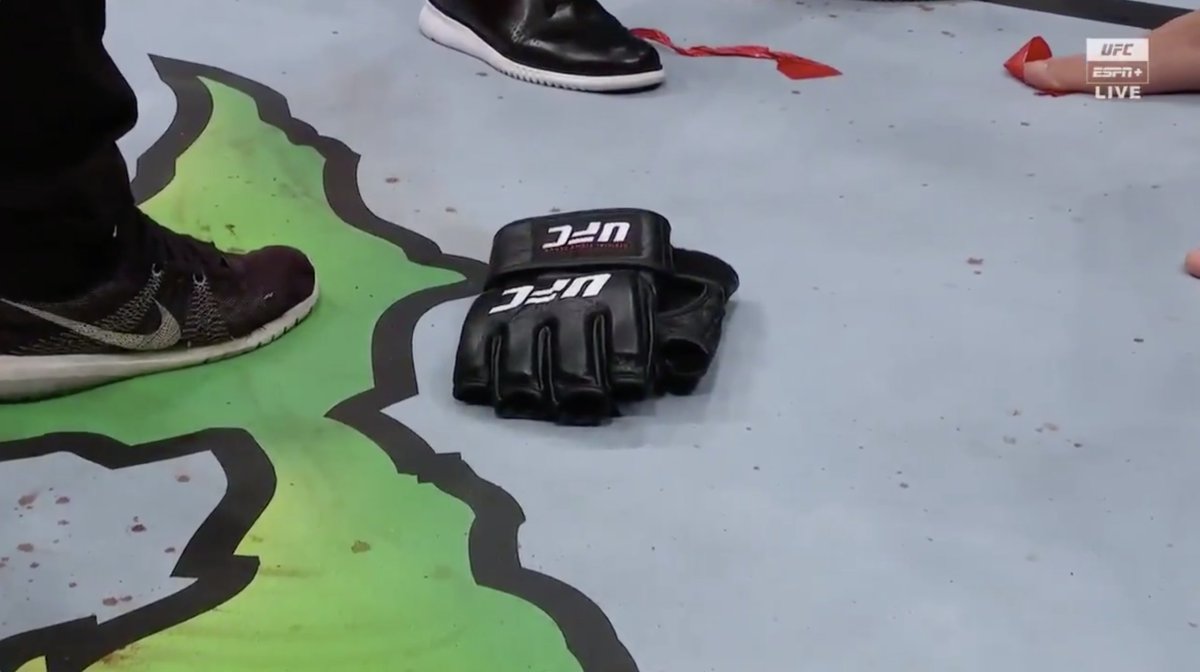 Khabib Nurmagomedov laid his gloves down in the Octagon after announcing his retirement at #UFC254