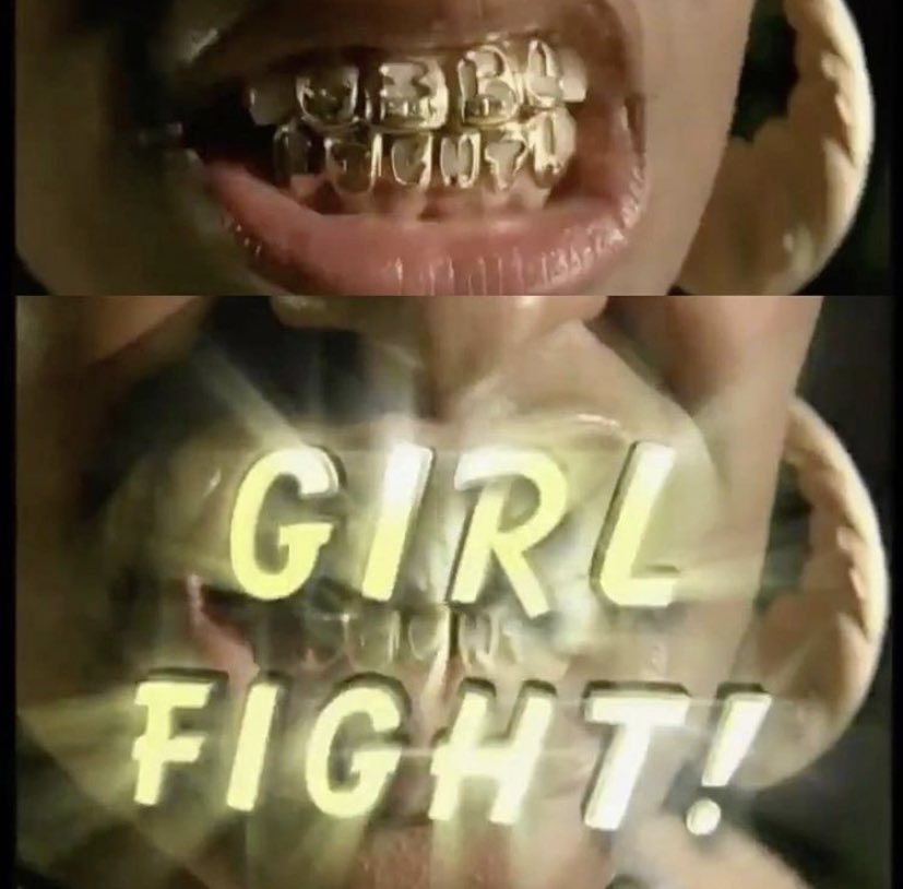 Thread of my favorite grills. First up is the open face “Girlfight” grill from Brooke Valentine’s 2005 “Girlfight” video.