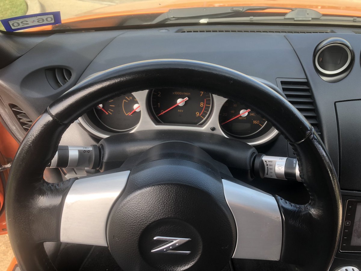 mustangtbird's tweet photo. Before and after a deserved steering  wheel flip flop. #350Z #solarorange https://t.co/xnoedL8nN1