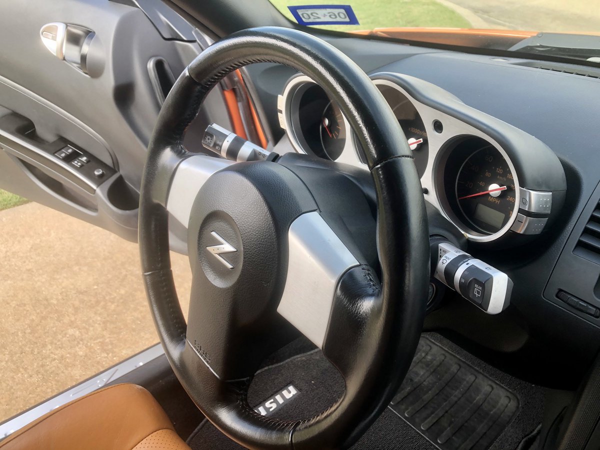 mustangtbird's tweet photo. Before and after a deserved steering  wheel flip flop. #350Z #solarorange https://t.co/xnoedL8nN1