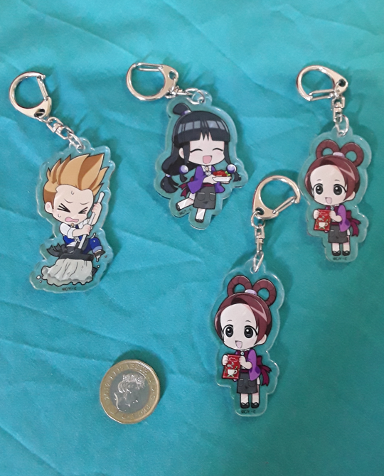anime based merch themed around cafe and stuff hh (its obvious the "secret" one is just Edgeworth in his pink apron hhhhhh)