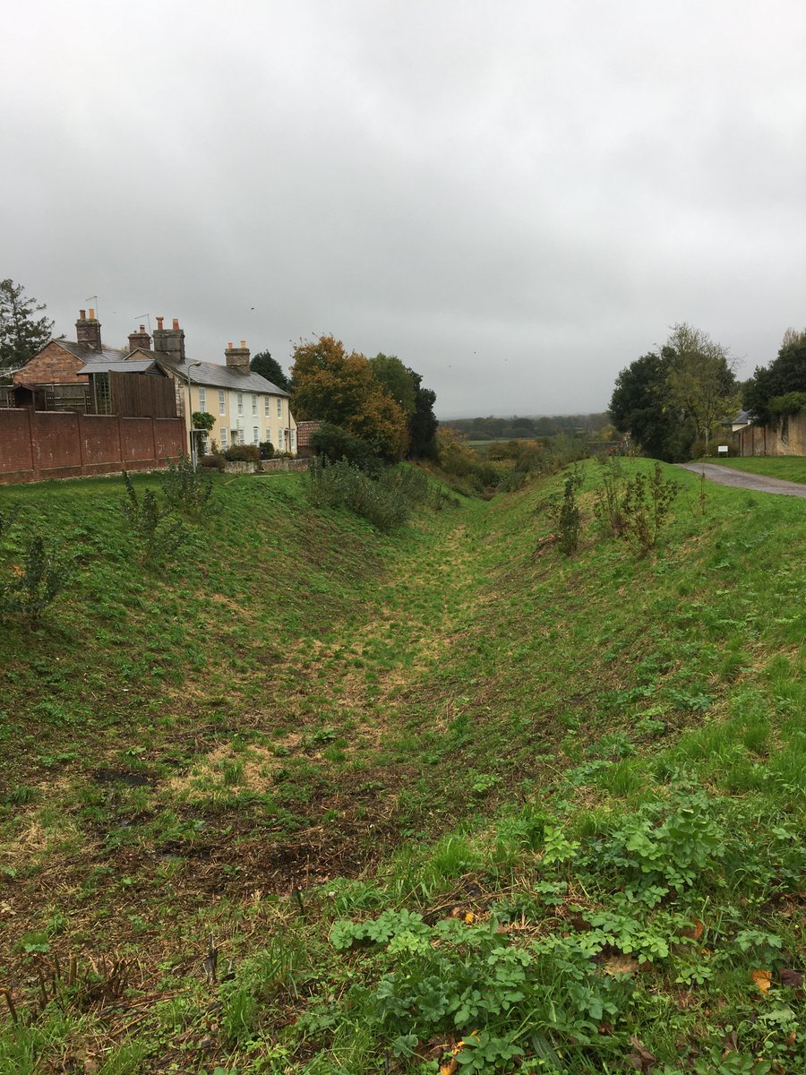Despite the grim weather, today's trip was to Wareham in Dorset to see the early medieval defences there. The earthworks don't photograph esp. well, but the most impressive element is their sheer size. This is the ditch on the west side.