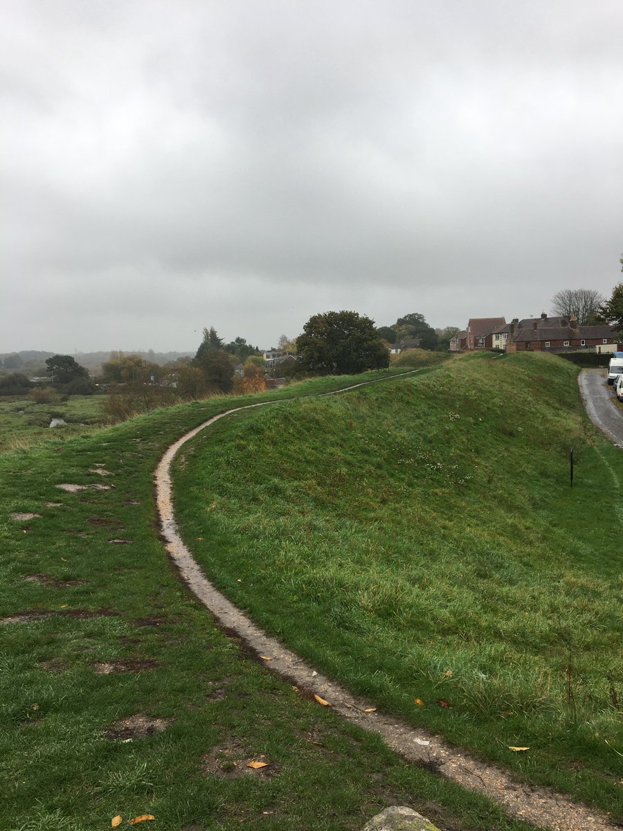 The defences are esp. large on the northern side, looking down on the River Piddle. Their age is hard to work out, but their existence is implied in the Anglo-Saxon Chronicle for 876, when the Viking army sheltered here.