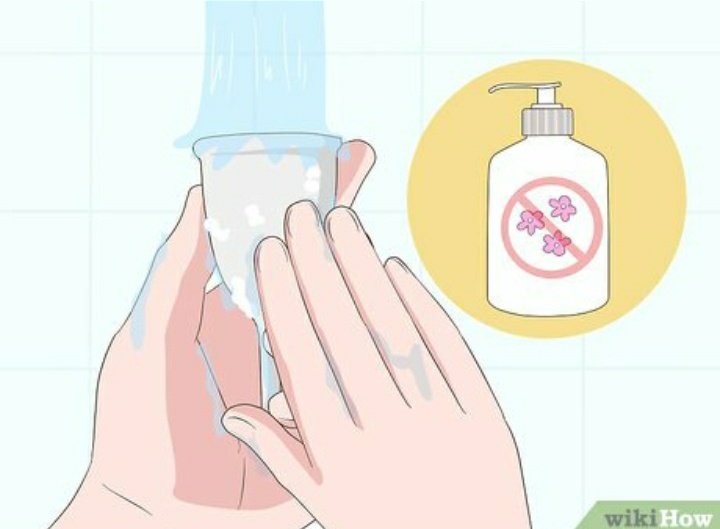 to remove your cup you simply pinch it inside you, creating a suction, and gently ease it out. when it's out, you empty your blood into the toilet, walk to your sink to rinse out the blood in cold water, and then reinsert it!