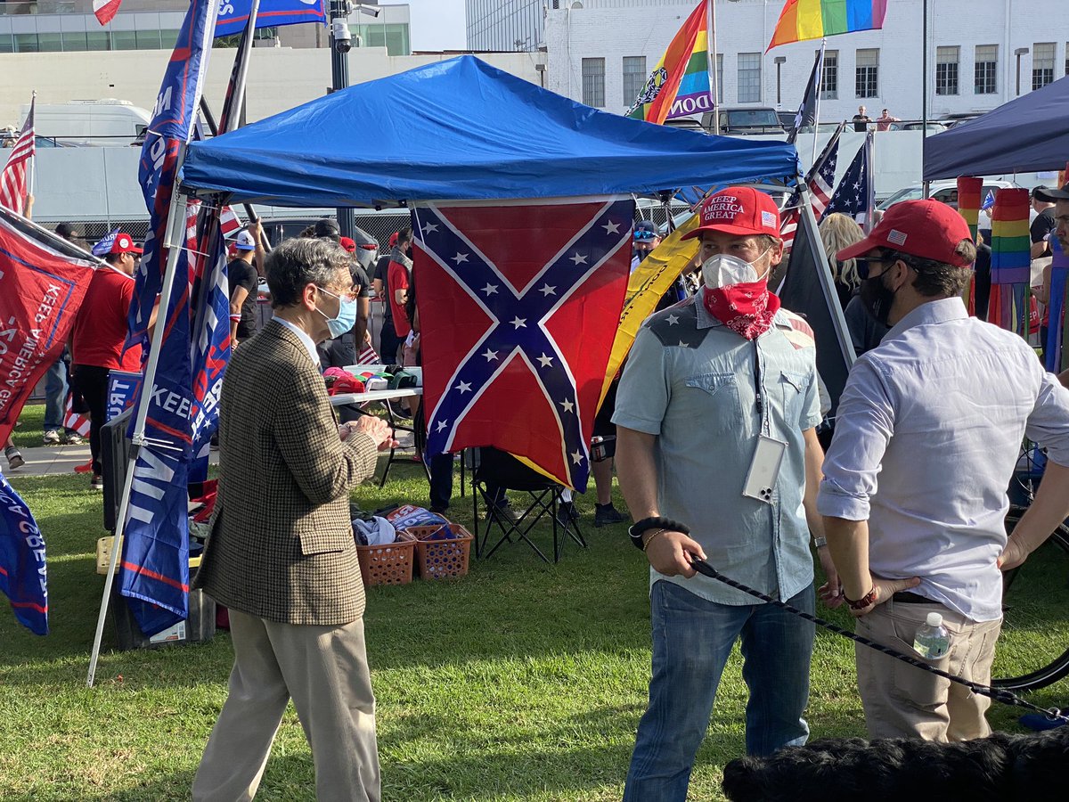 Confederate flag hanging under one of the many tents here