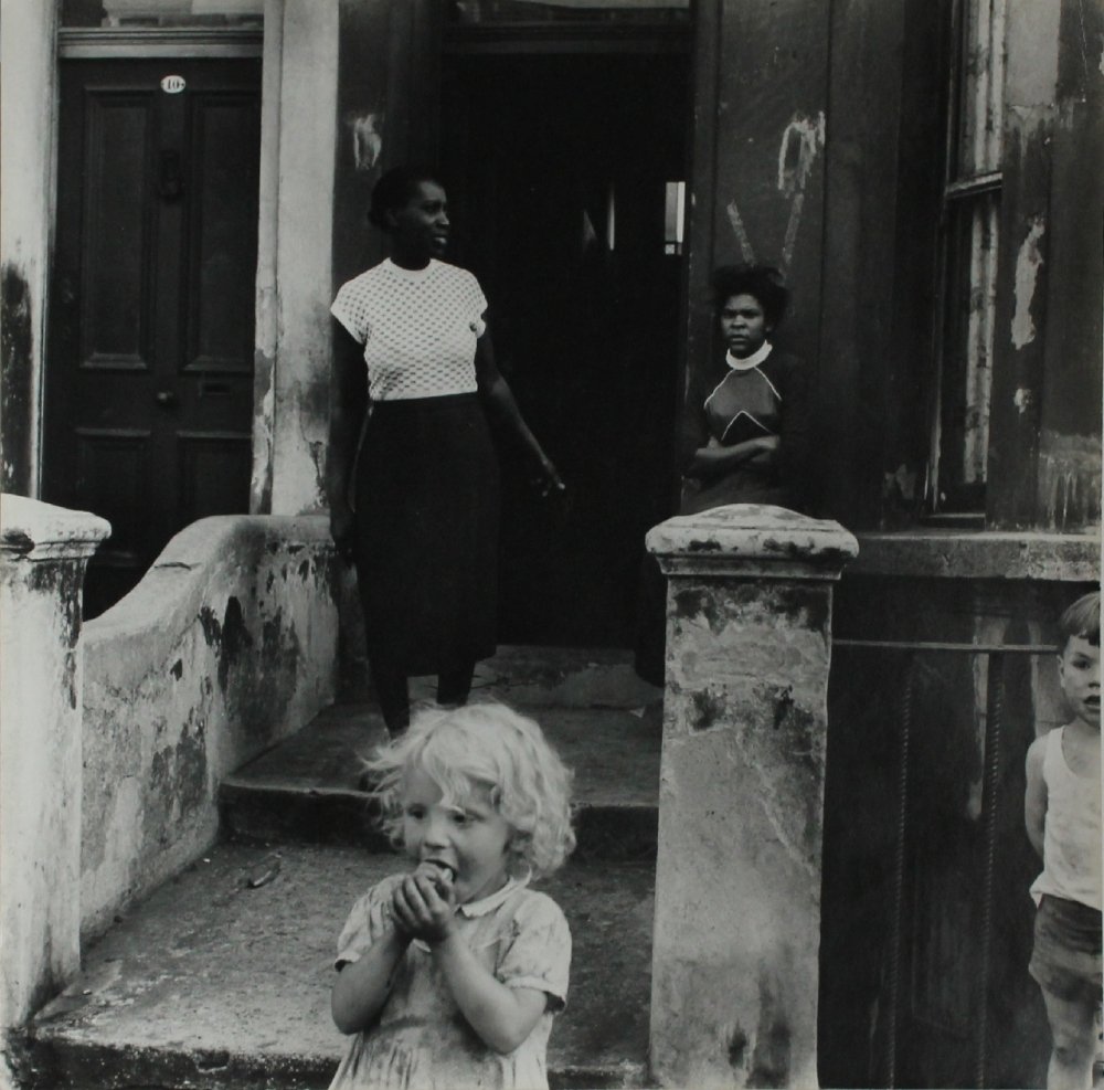 No one is born racist .Kids after being given a treat from their West Indian neighbours, North Kensington, 1955.Photo Roger Mayne