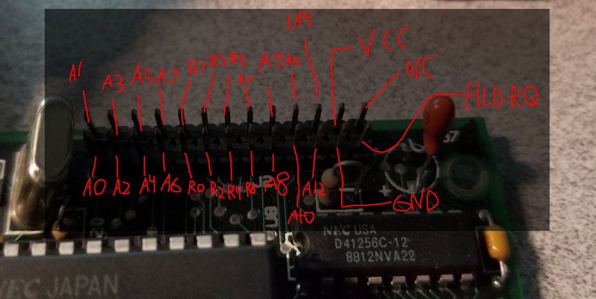 I beeped out the expansion connector.It seems to have 13 address pins, although "address" is kinda funky on a V40. they're also data.... R0-R7 go to A0-A7 pins on the DRAM chips, so I think they're the real address and A0-A7 are used as data?