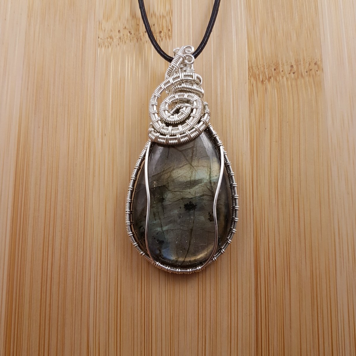 I'll wrap up the week here, before I go through every soul in the store.There are 27 labradorite pendants to choose from, and I need your help finding them homes:  https://www.etsy.com/shop/oishiny/?section_id=28088202Free international shipping included. #Halloween  #EtsyShop  #ShopIndie  #SmallBiz