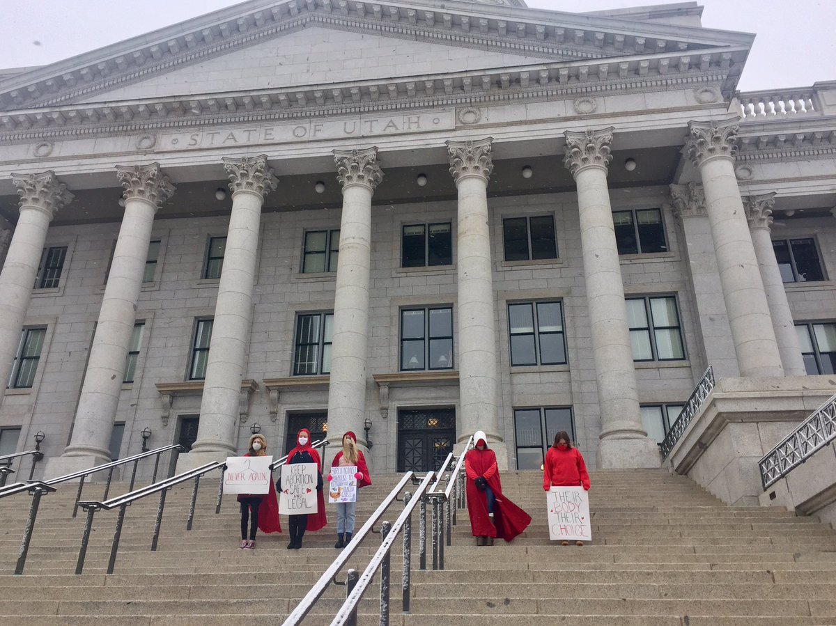 EnriqueLimon's tweet photo. Taking a page out of @MargaretAtwood, a 'red cloak protest' for women's rights is underway at the Capitol this snowy morning. Praise be #utpol #slcprotests https://t.co/WisB89dNhf