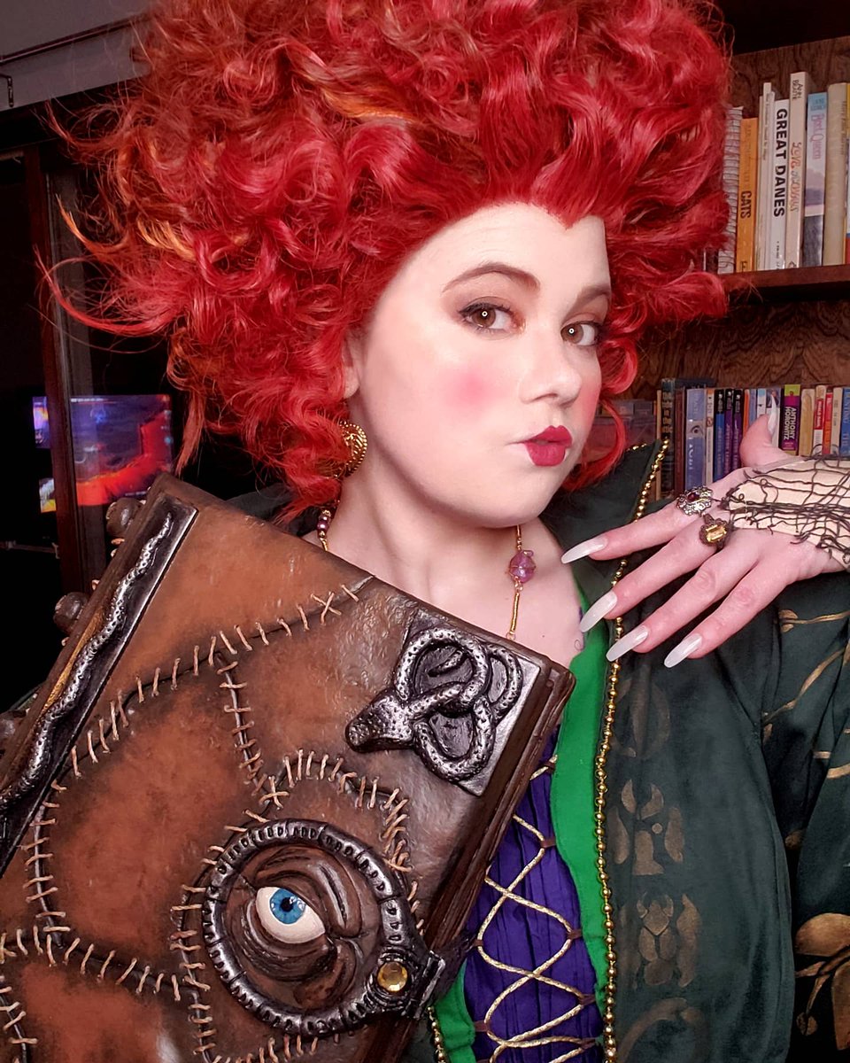SynergyCraftCos's tweet photo. Had a shoot yesterday, excited to share some #winifredsanderson selfies today! 🧡💚💜 I had so, so much fun going for a test run with this cosplay, the wig is so huge and ridiculous and makes me super happy.⁣ #hocuspocus #cosplayselfie #spookyselfie https://t.co/0TMSinXNSm