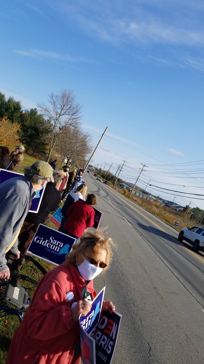 JLeahMitchell's tweet photo. @mainepublic Biden supporters lining the route where President Trump is expected to pass through on his way from Bangor to Levant. https://t.co/oLXXfkdnNi