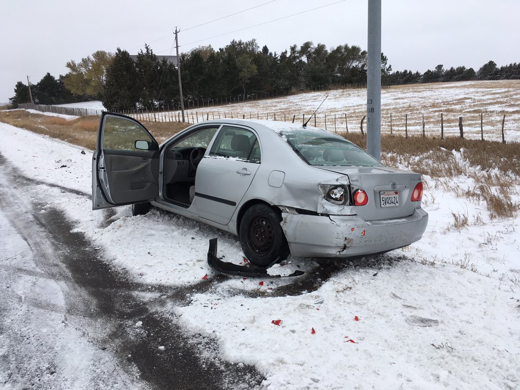 Picture of my wrecked car in a ditch