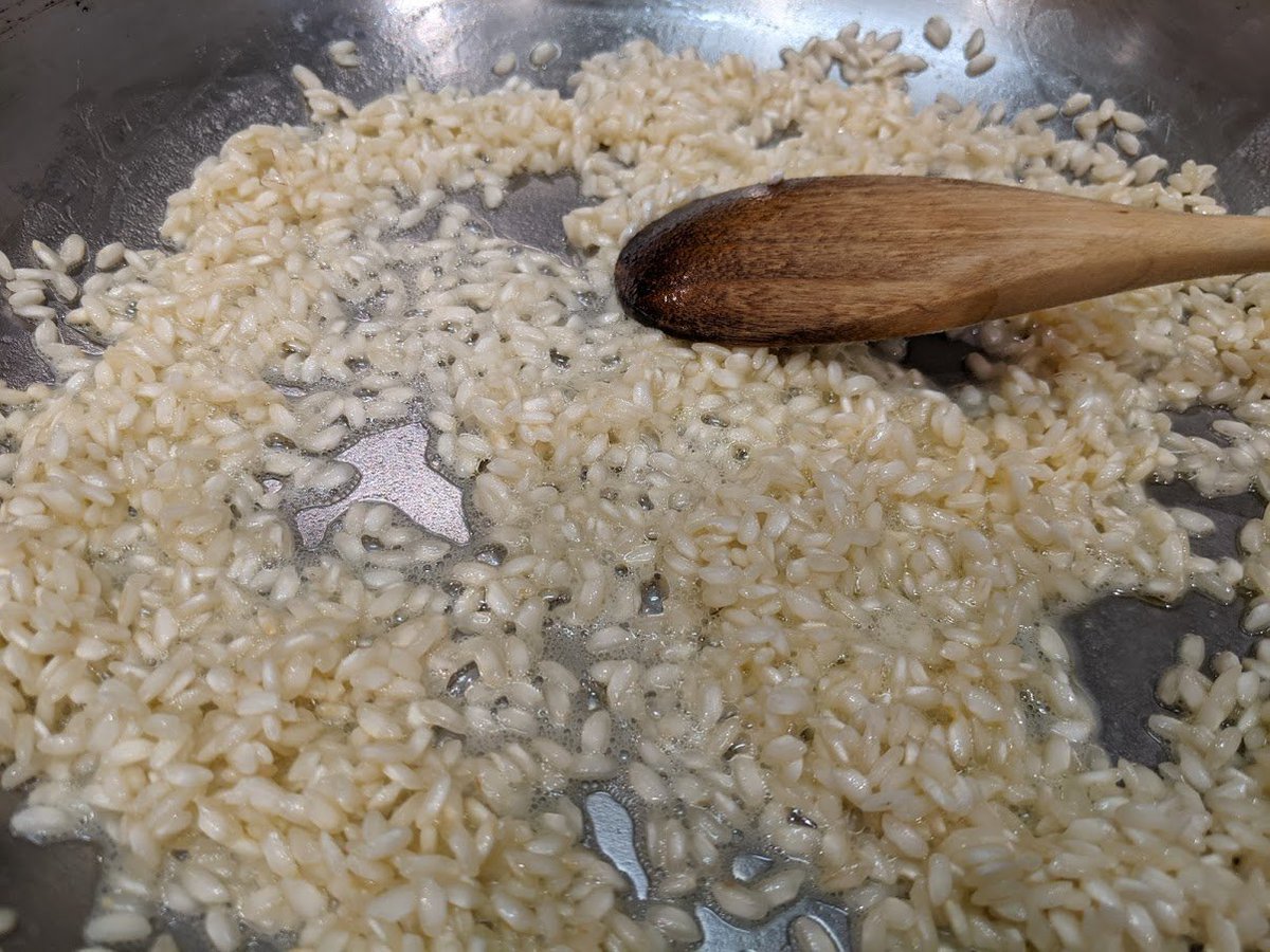 Another of risotto's frustrating secrets... How long to simmer the rice in butter?You don't want it to brown or crisp up, but you do want it to soften and go translucent. This photo is just before I added the deglazing liquid, and not one grain has browned. Phew!