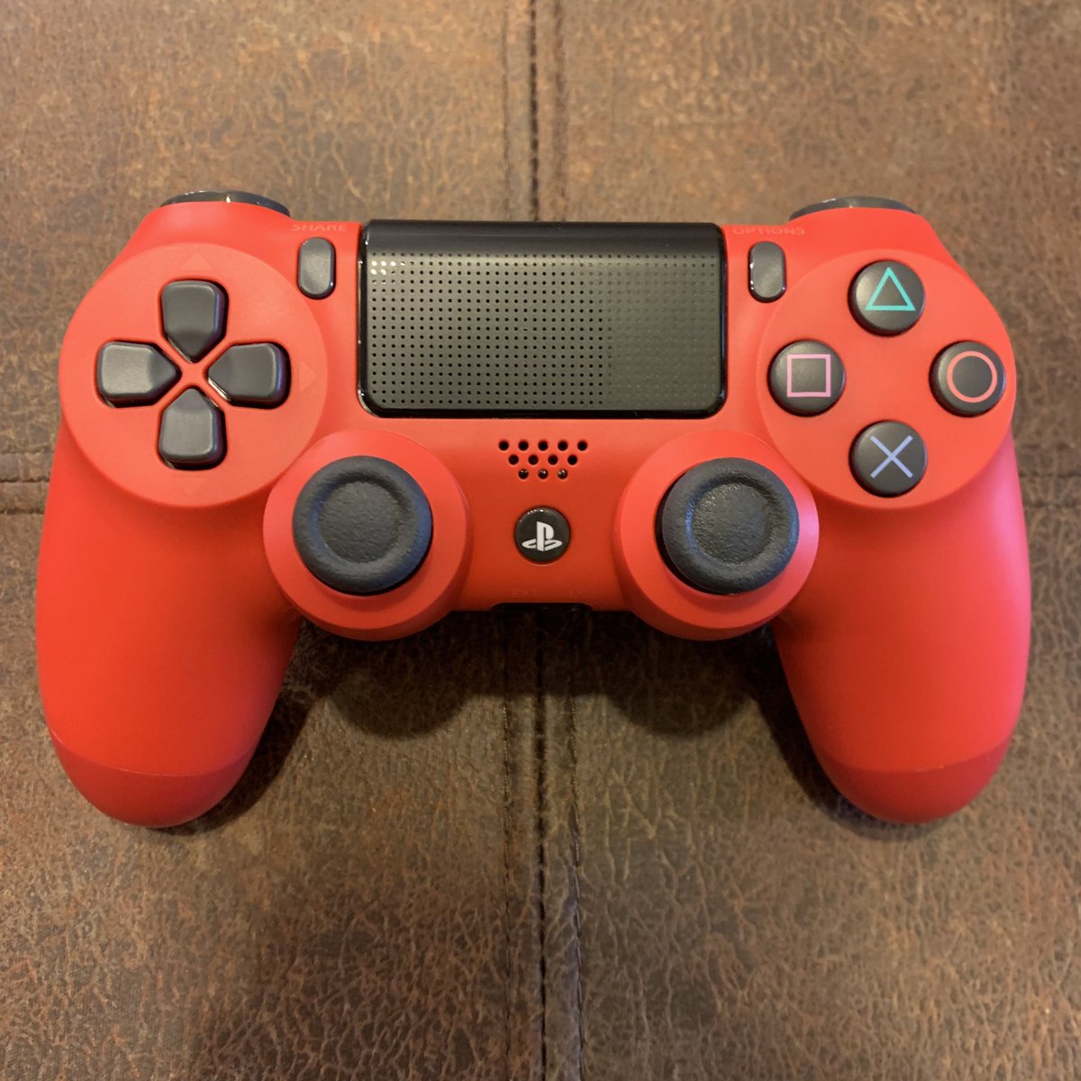 ArtieTheR3D's tweet photo. Being ArtieTheRed I only felt it fitting that I pick up this #MagmaRed #PS4 #DUALSHOCK4. My 20th Anniversary Edition and Crystal controllers are ready to start being cycled out. https://t.co/GPKvHNv96e