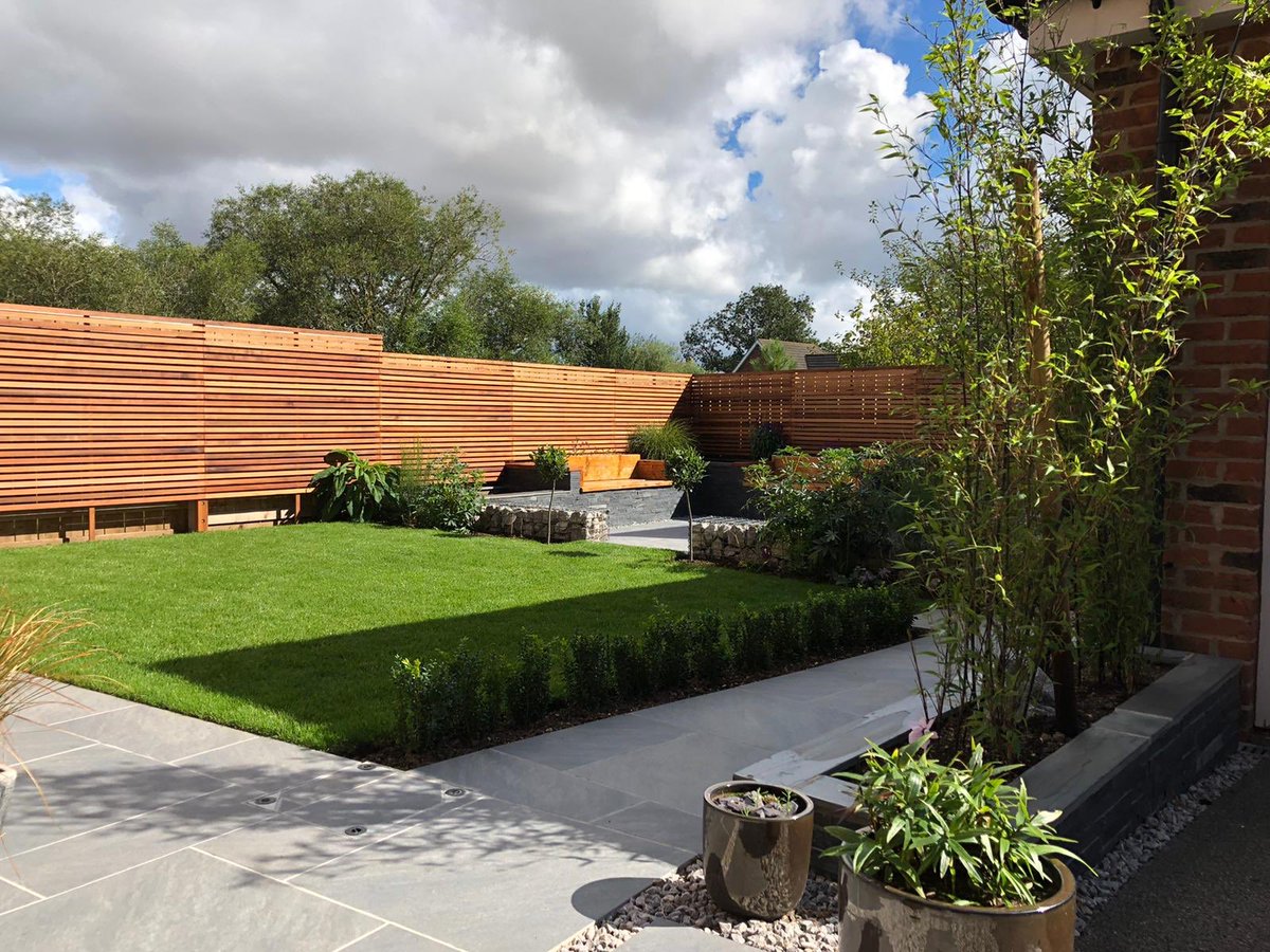 LandKWarcup's tweet photo. This may have been a personal project over the last two summers but it’s by far been worth it. Full garden transformation using @BradstoneUK porcelain paving &amp; natural walling slips. https://t.co/GjDcs9ow8D