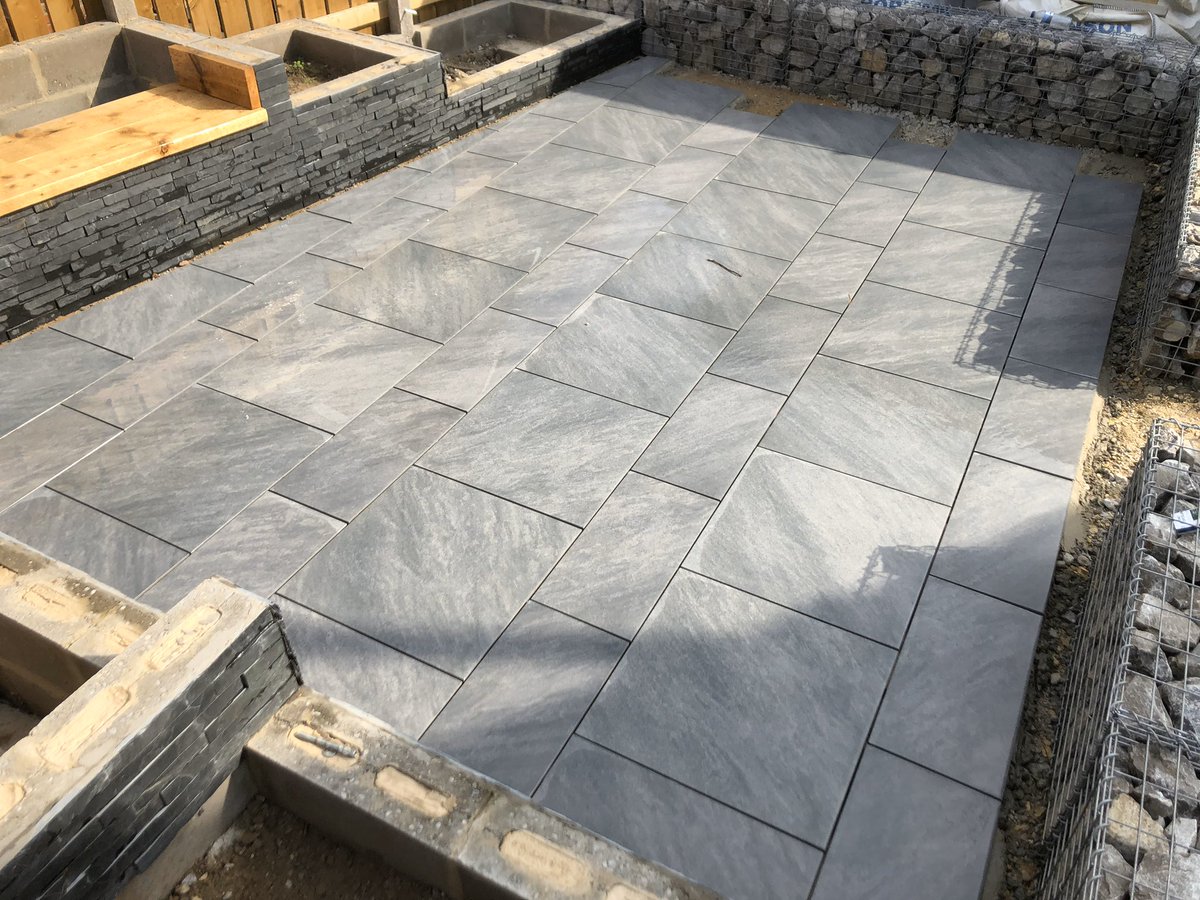 LandKWarcup's tweet photo. This may have been a personal project over the last two summers but it’s by far been worth it. Full garden transformation using @BradstoneUK porcelain paving &amp; natural walling slips. https://t.co/GjDcs9ow8D