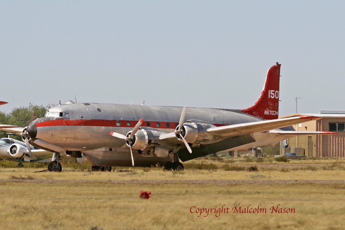 Four former fire-bomber Douglas C54's parked at Marana Regional Airport for many years are moving on - N96451 is reported to be restored and flown out, N67040 to Mojave for us by Scroggins Aviation Mockup & Effects as a movie prop while N6816D and N67034 will be scrapped.#avgeek