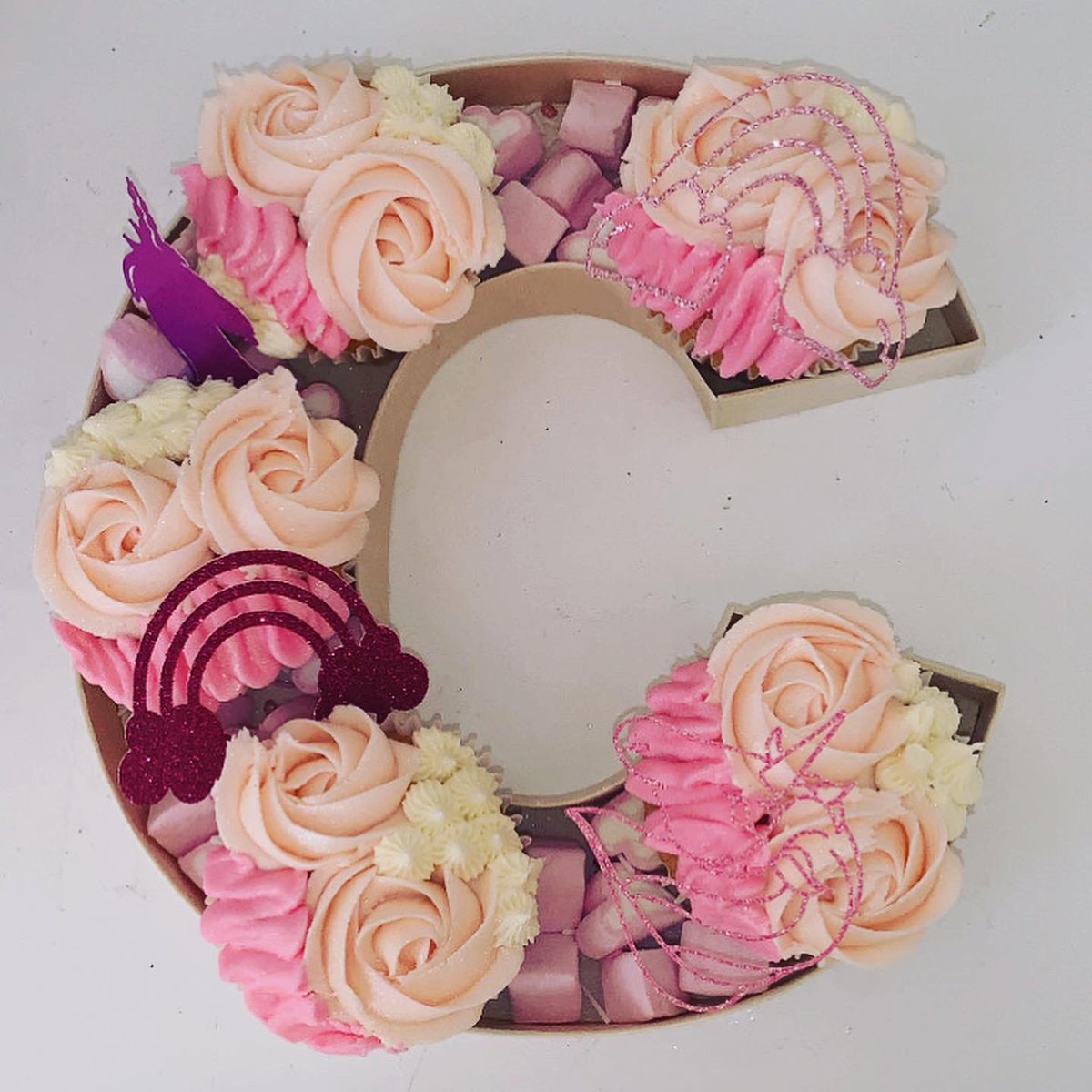 fairybakesx's tweet photo. 🦄 CANDY FLOSS 🌈

Letter C filled with vanilla and candy floss cupcakes! 

#cupcakeletter #cupcakes #fairybakes #baking #baker #candyfloss #unicorn #rainbow #hemelhempstead #supportlocal #supportsmallbusiness https://t.co/yT9TrtgFtV