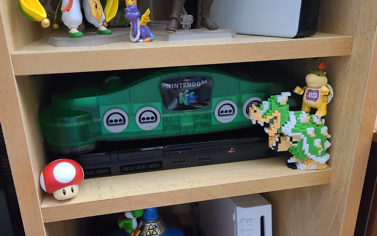 Coming back to this thread to update that I finally managed to install a shelf for my n64 & ps2. Previously was on the left side but making space for a bigger screen meant sacrificing said shelf so I manually customized the other side since there was space! It looks great! :3