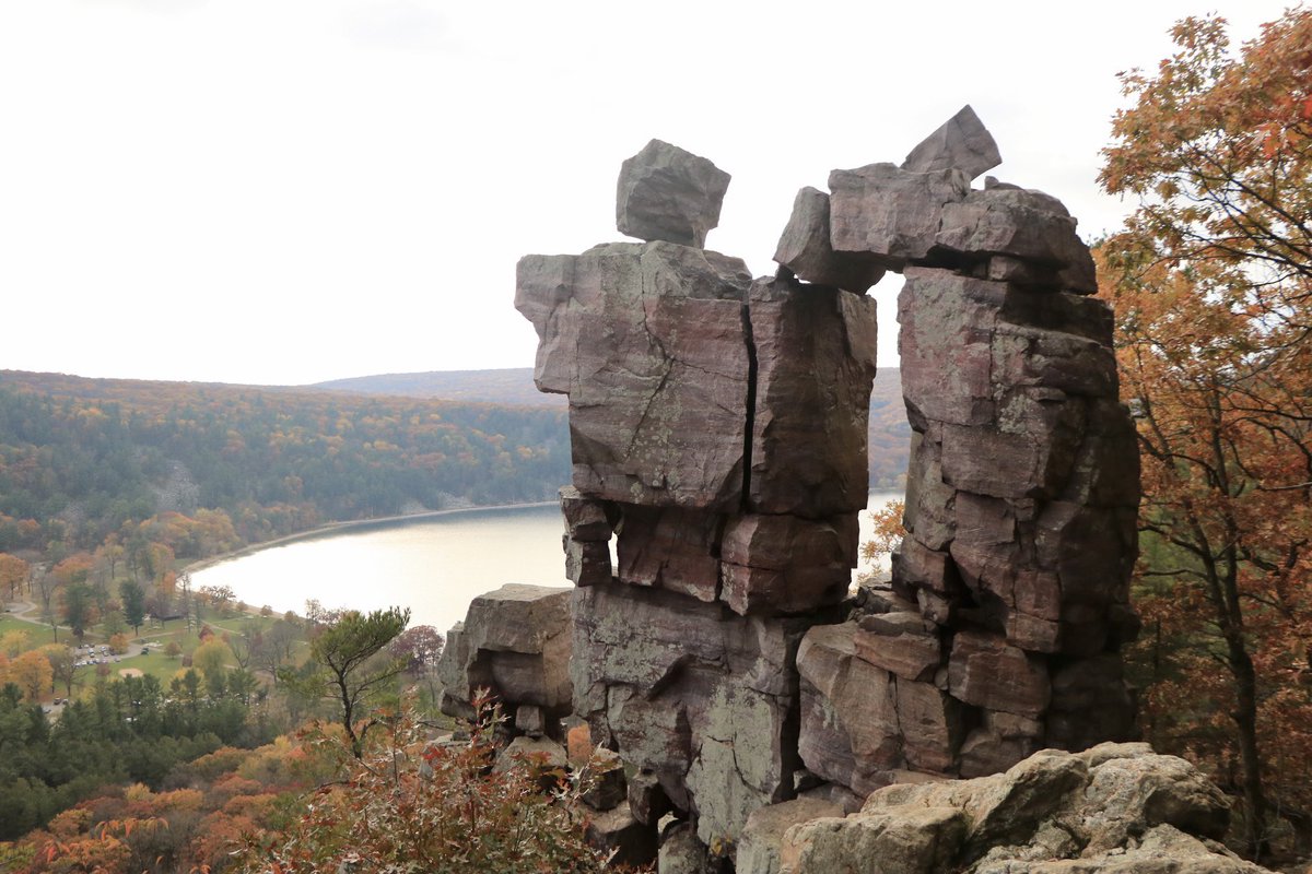 Ashkayk's tweet photo. They call this the “Devil’s Doorway”... so I imagine it leads directly to the White House. 

#Fall #devilslakestatepark #devilsdoorway https://t.co/amwtthhf6p