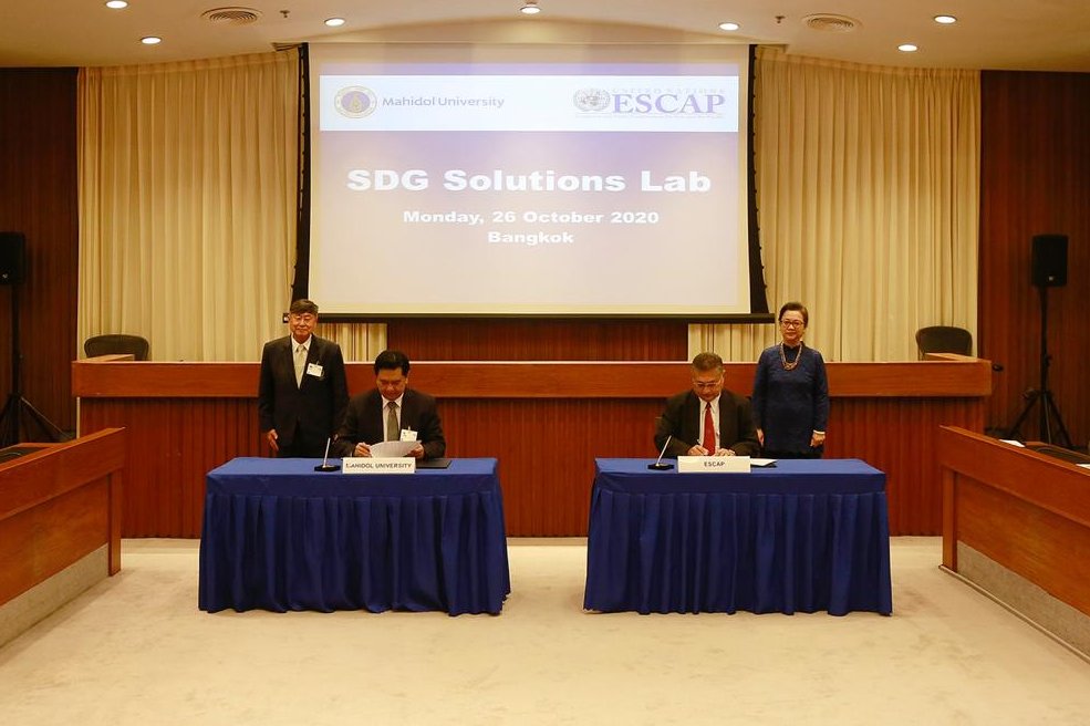 UNESCAP's tweet photo. .@UNESCAP &amp; @MahidolU sign MoA to pilot an #SDG Solutions Lab to develop and put in place innovative and technological solutions to support #AsiaPacific achieving the #2030Agenda. https://t.co/xEBUFWOw0Z